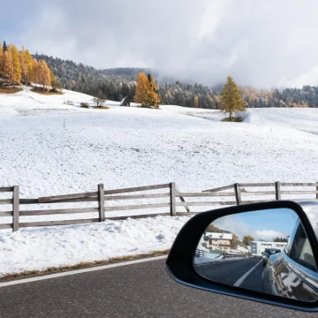 Snowy landscape as seen from a car window